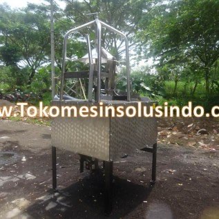 Mesin Pengupas Kulit Kelapa Muda